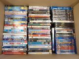 a lot of dvds in a box on the table