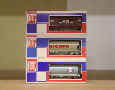 three boxes that are stacked on top of each other