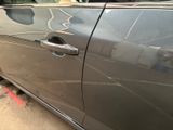 a car that is parked on the side of the street