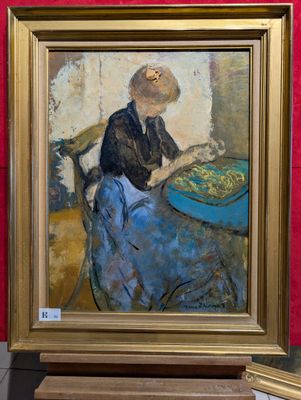 un tableau représentant une femme assise à une table