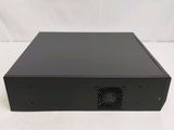 a black computer case sitting on top of a white table