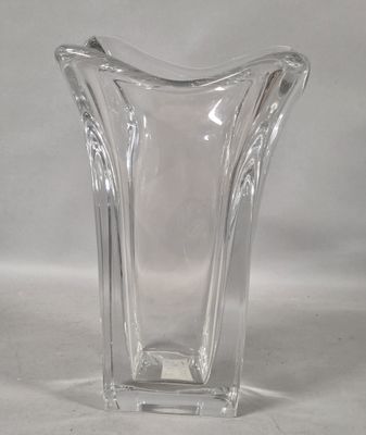 a glass vase that is sitting on a table
