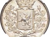 an old silver coin with a crown on top of it