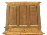 an old wooden easel with a window on it