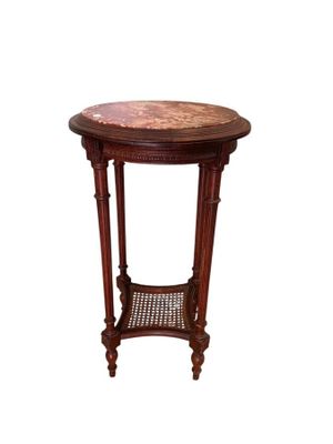 an image of a round table with a wooden top and wicker shelf