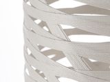 a close up of a white vase with a pattern on it