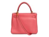 a pink leather handbag on a white background