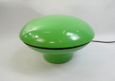 a green light that is on top of a table
