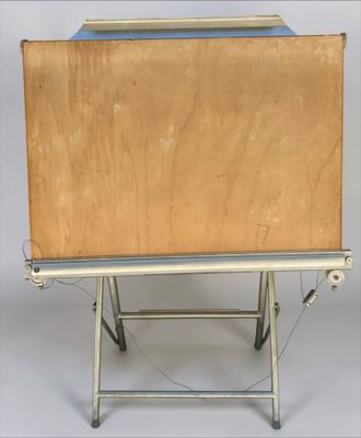 a wooden box on a metal stand on a white background