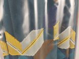 a close up of a vase with a tie on it