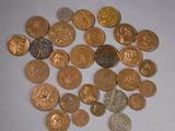a lot of coins that are on the table