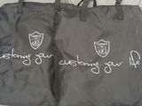 two bags that have some writing on them