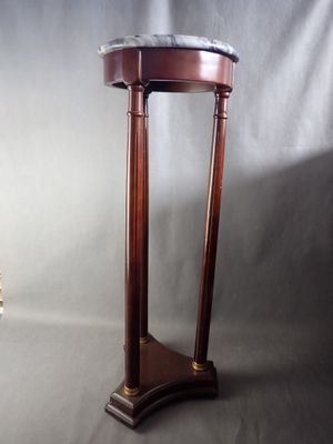 an image of a wooden table with a marble top on a grey background