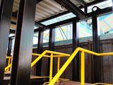 a train car that has a lot of stairs going up to it