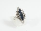 a close up of a ring on a white surface