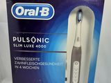 oral b pulsonic slim lux 4000 electric toothbrush in box