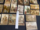 a lot of old postcards that are on the table