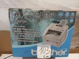 a box that has a printer on top of it