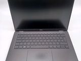 the laptop is open and ready to be used on the desk