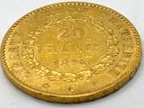 an image of a gold coin with the number twenty on it