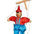 a wooden marione with a wooden cross on top of it