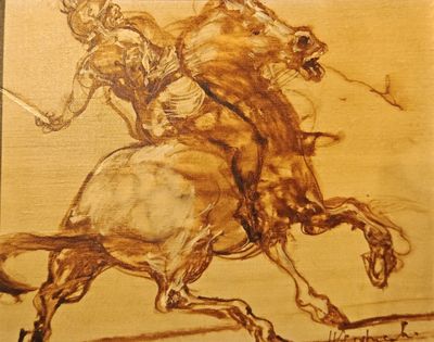 drawing of a man riding a horse with a spear in his hand