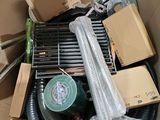 a cardboard box filled with assorted items in it