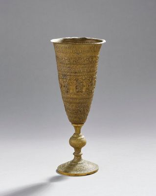 gold goblet in the shape of a cup