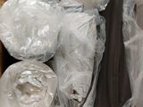 a cardboard box filled with rolls of toilet paper