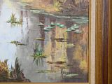 a painting of water lillies in a pond