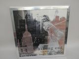 a picture of a picture of a woman on the cover of a cd