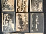 many old photographs of people on a black surface