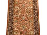 an oriental rug with a long border and a design on the bottom
