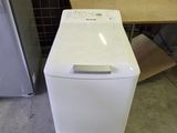 an image of a white dishwasher sitting in a room