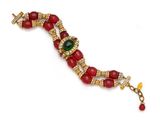 a close up of a red and green bracelet on a white surface