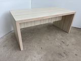 an image of a wooden desk in a room