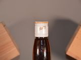 a bottle of beer that is sitting on a table