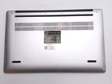 a close up of a laptop with a battery on it