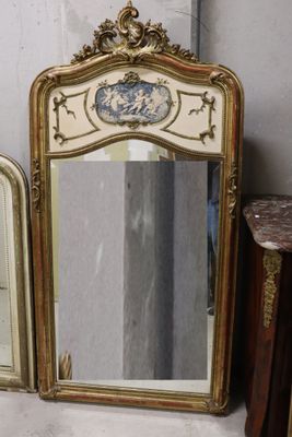 three mirrors that are sitting on a shelf next to each other