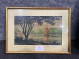 framed picture of a painting of a lake and a tree