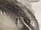 a fish that is wrapped in plastic and ready to be eaten