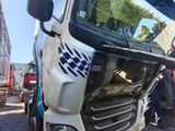 a white truck that is parked on the side of the road