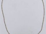 a gold chain necklace with a diamond clasp on a white background