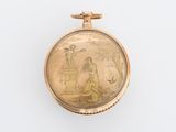 une image représentant une montre de poche en or sur laquelle figurent un homme et une femme