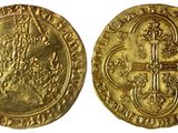 une pièce d'or avec une croix au recto et une croix au verso