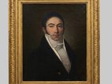portrait of a gentleman in a black coat and white shirt