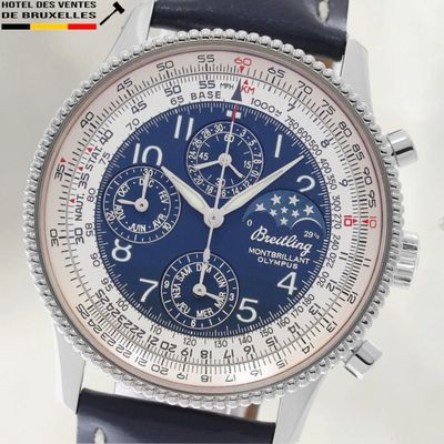 gros plan d'une montre-bracelet avec un cadran bleu