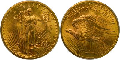 a close up of two gold coins on a white background