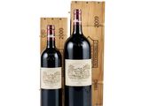 two bottles of red wine in a wooden box