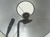 a lamp that is on a pole with a light on it